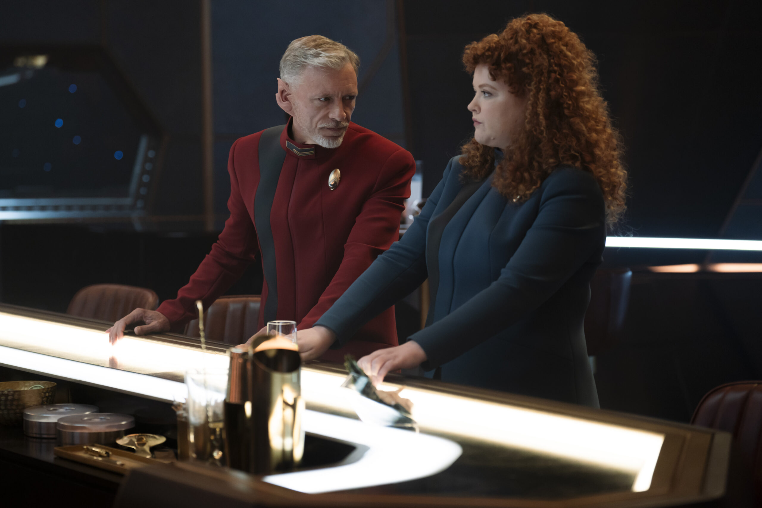 Star Trek: Discovery Season 5 Episode 3 Jinaal | Tell-Tale TV Commander Rayner and Lieutenant Tilly sit at a bar on the U.S.S. Discovery on Star Trek: Discovery Season 5 Episode 3, "Jinaal."