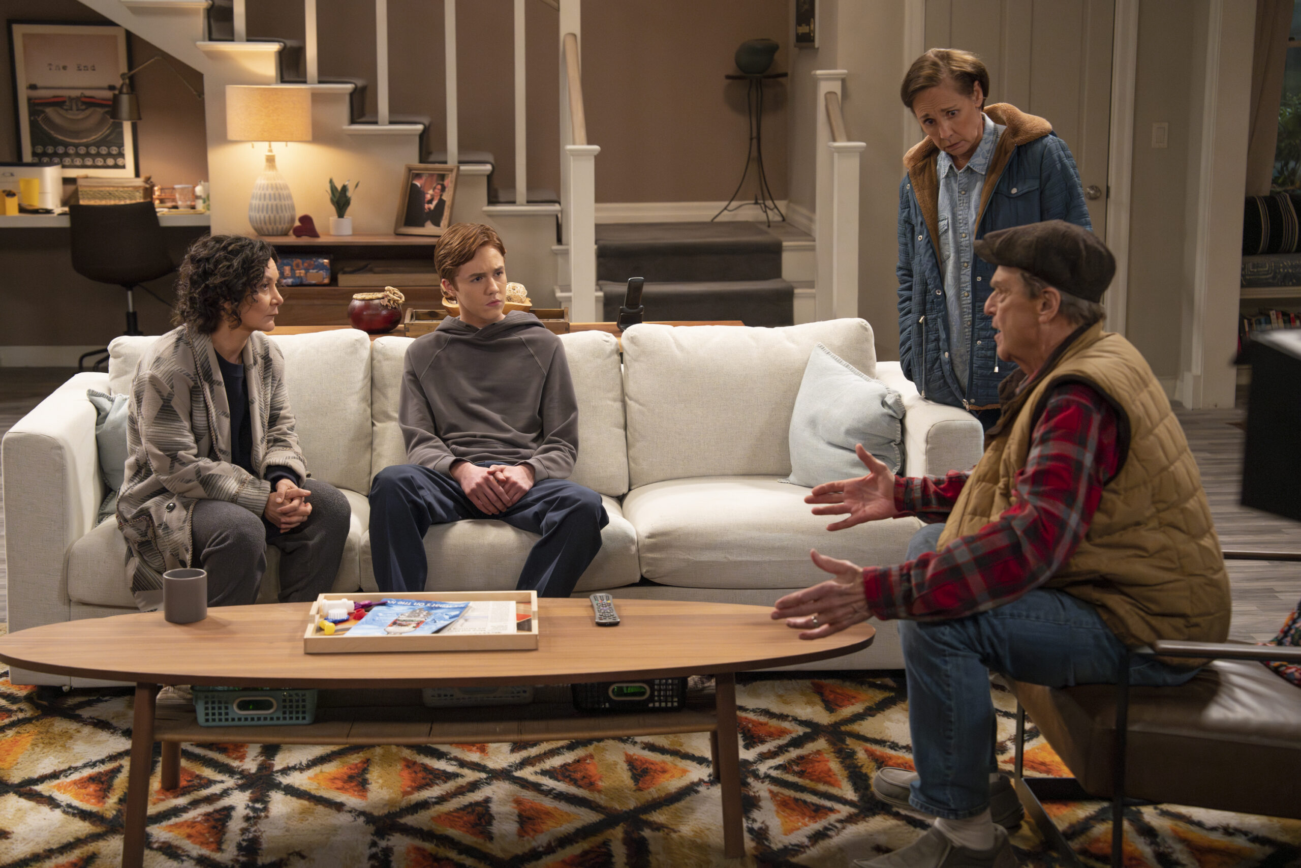 SARA GILBERT, AMES MCNAMARA, LAURIE METCALF, JOHN GOODMAN | Tell-Tale TV The Conners Season 6 Episode 13 - SARA GILBERT, AMES MCNAMARA, LAURIE METCALF, and JOHN GOODMAN hang out in Darlene's living room.