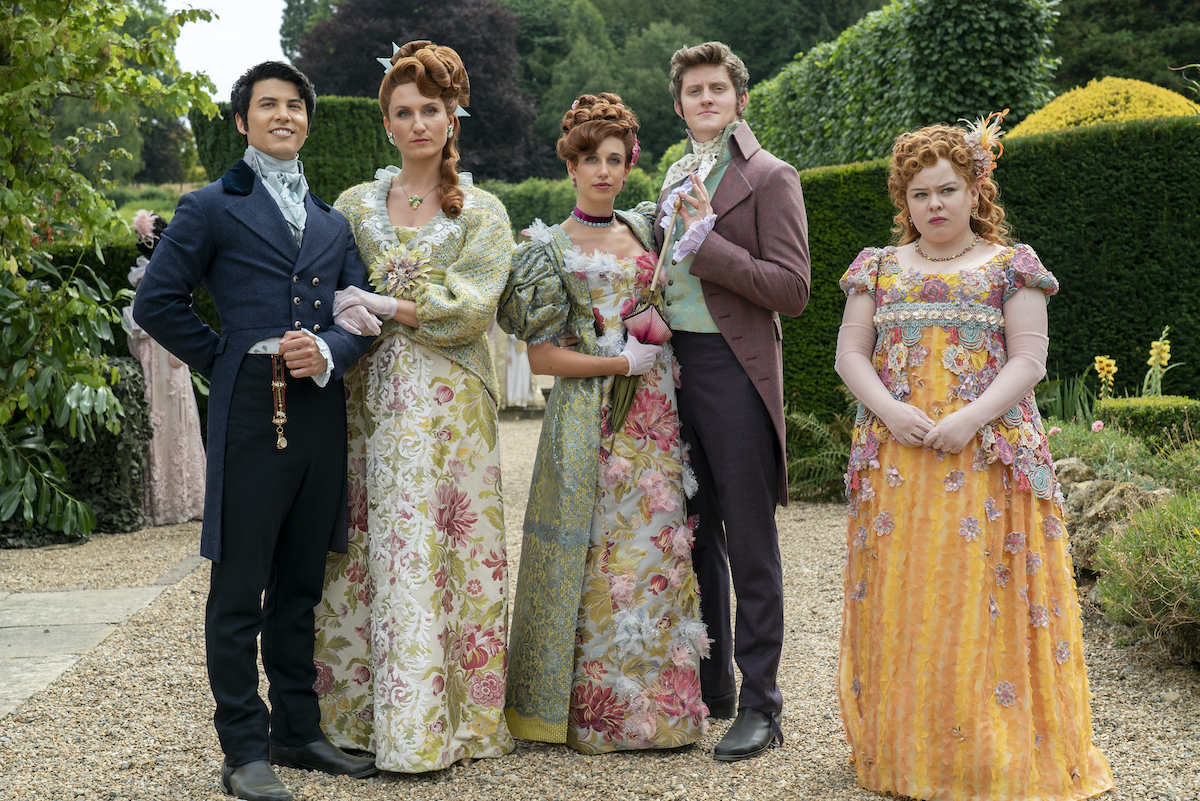 BRIDGERTON Season 3 Episode 1 James Phoon as Harry Dankworth, Bessie Carter as Prudence Featherington, Harriet Cains as Philipa Featherington, Lorn Macdonald as Albion Finch, Nicola Coughlan as Penelope Featherington