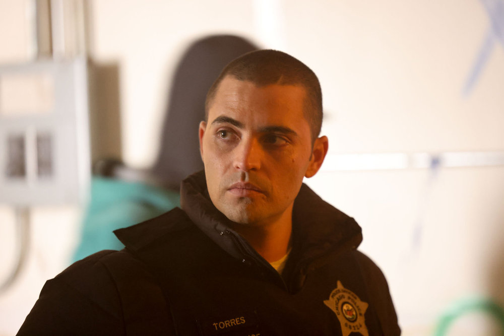 Chicago P.D. Season 11 Episode 13 - Benjamin Levy Aguilar as Dante Torres with a serious look on his face. Preview — Chicago P.D. Season 11 Episode 13: Will Voight Survive the Season Finale? Chicago P.D. Season 11 Episode 13 - Benjamin Levy Aguilar as Dante Torres with a serious look on his face.