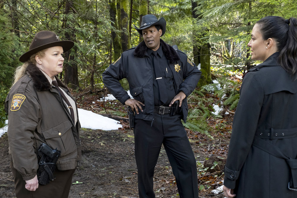 Resident Alien Season 3 Episode 8, "Homecoming" -- Elizabeth Bowen as Deputy Liv Bake, Corey Reynolds as Sheriff Mike Thompson, Nicola Carreia-Damude as Detective Torres | Tell-Tale TV Resident Alien Season 3 Episode 8, "Homecoming" -- Elizabeth Bowen as Deputy Liv Bake, Corey Reynolds as Sheriff Mike Thompson, Nicola Carreia-Damude as Detective Torres