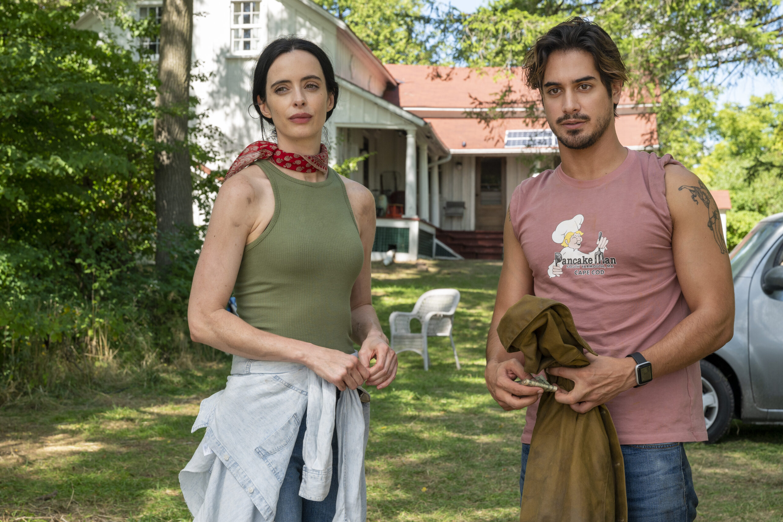 Still from Orphan Black: Echoes Season 1 Episode 1 of Krysten Ritter as Lucy and Avan Jogia as Jack pictured from left to right.