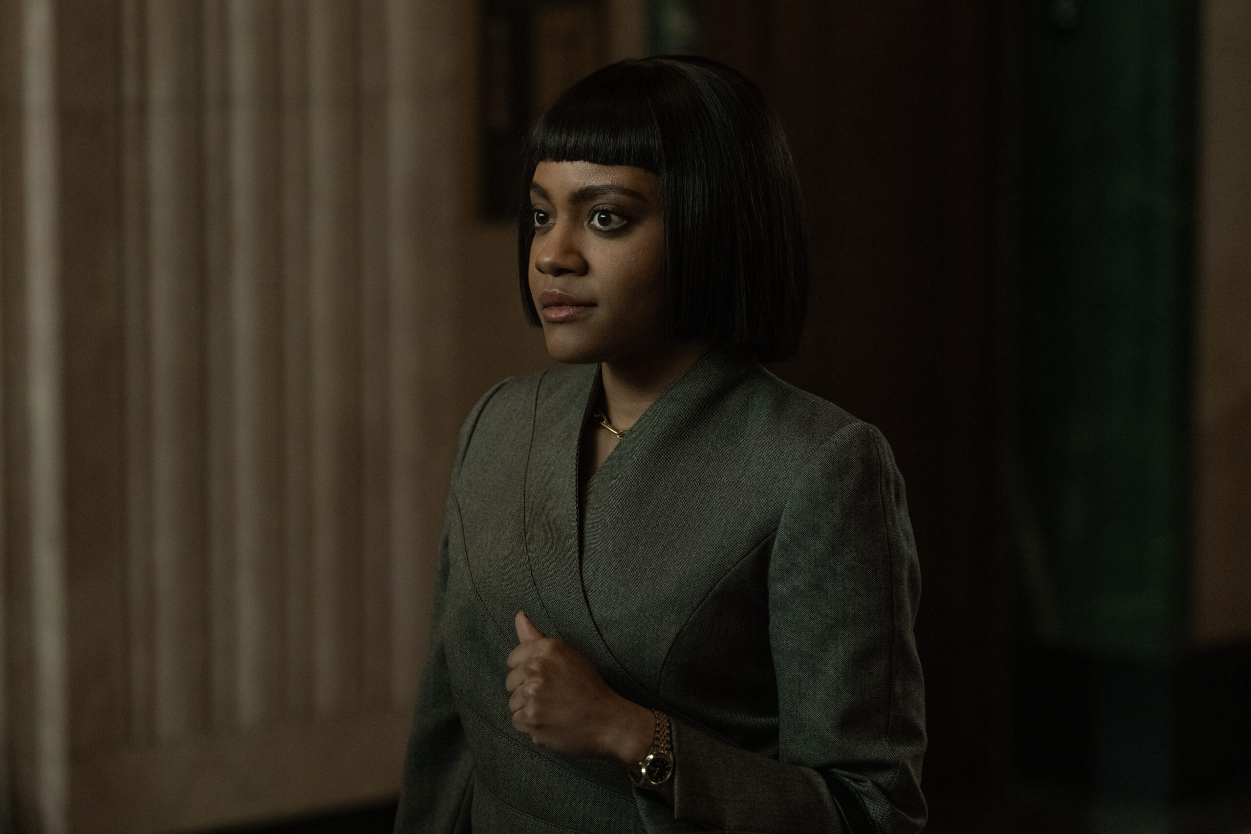 Close up of Gabby Beans in a gray suit.