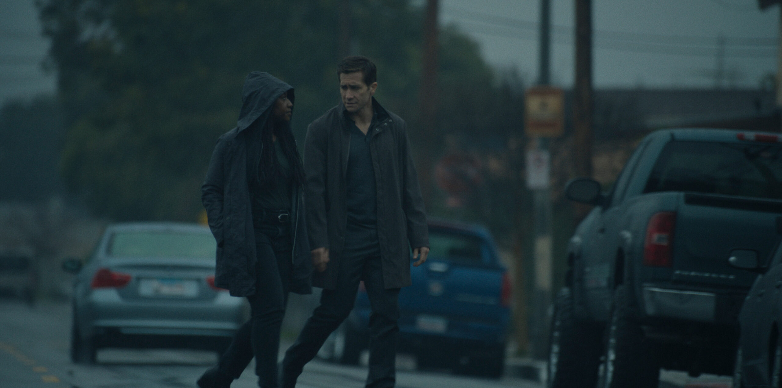Nana Mensah and Jake Gyllenhaal walking down the street.