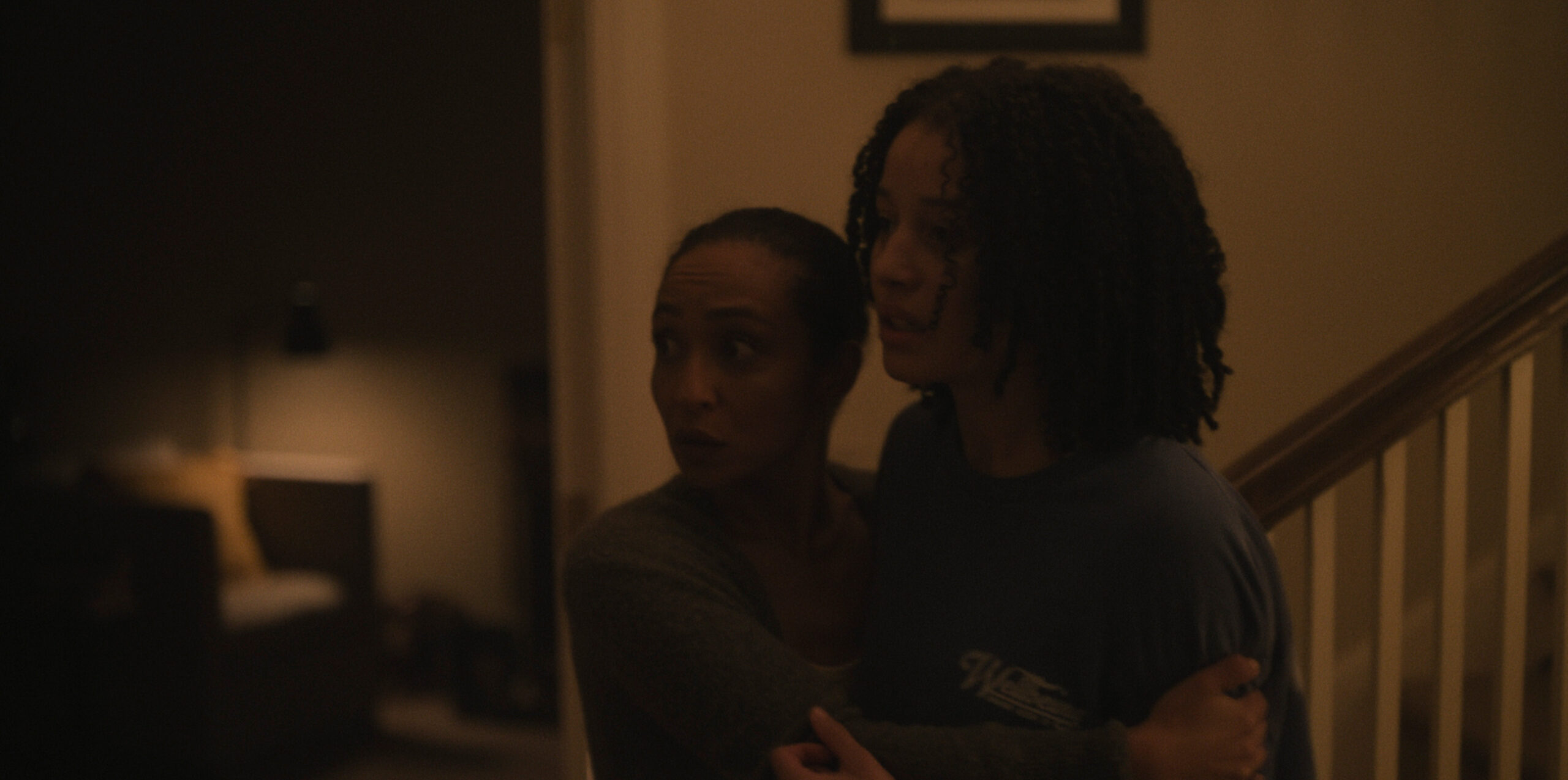 Ruth Negga holding Chase Infiniti.