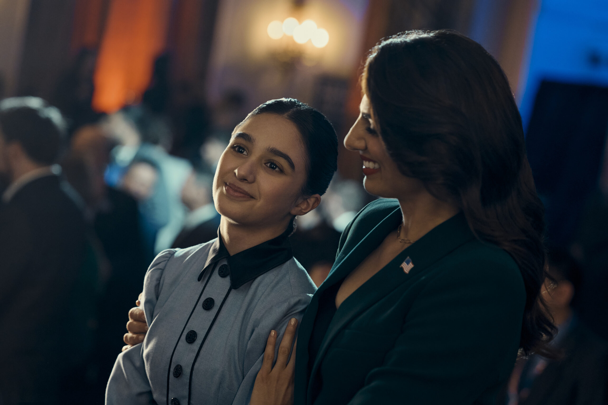 The Boys Season 4 Episode 1 - Claudia Doumit | Tell-Tale TV Still from The Boys Season 4 Episode 1 of Claudia Doumit as Victoria Neuman picture with a teen girl.