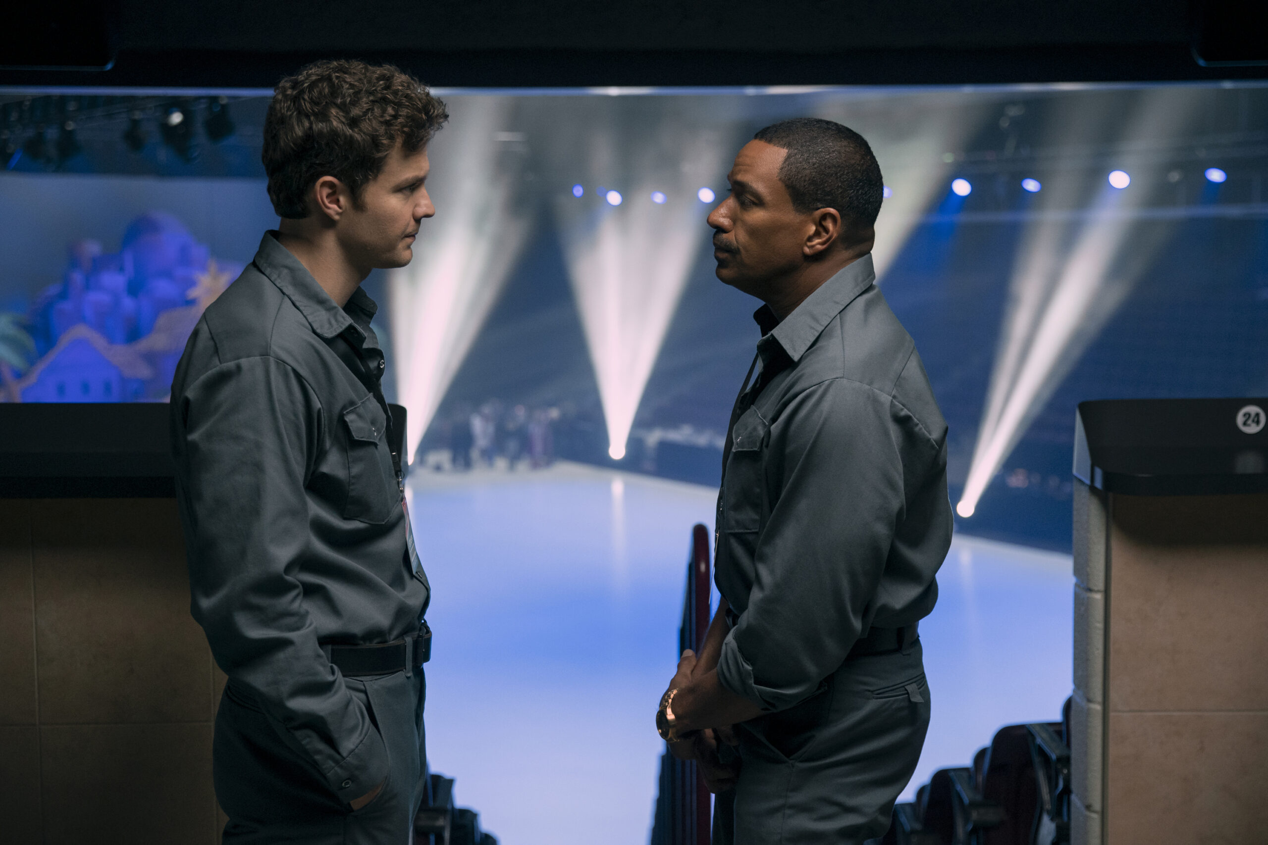 The Boys Season 4 Episode 3 -Jack Quaid and Laz Alonso | Tell-Tale TV Still from the Boys Season 4 Episode 3 of Jack Quaid as Hughie Campbell and Laz Alonso as Mother's Milk dressed in a similar blue uniform pictured from left to right.