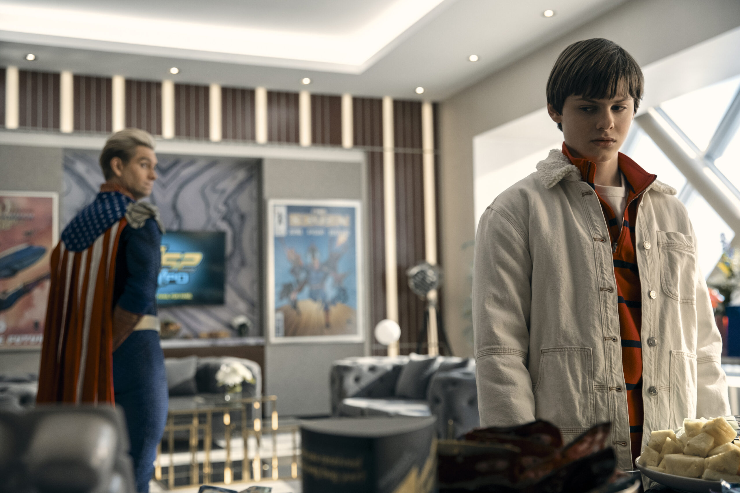 Still from The Boys Season 4 Episode 5, "Beware of the Jabberwock, My Son," of Antony Starr as Homelander and Cameron Crovetti as Ryan pictured from left to right.