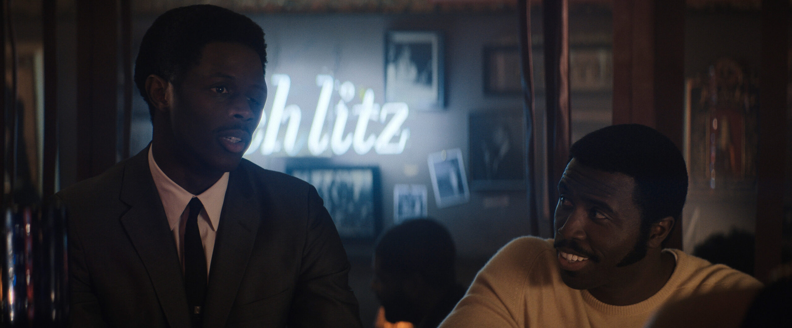 Still from Lady in the Lake Season 1 Episode 1 of Josiah Cross and Y’lan Noel pictured from left to right.