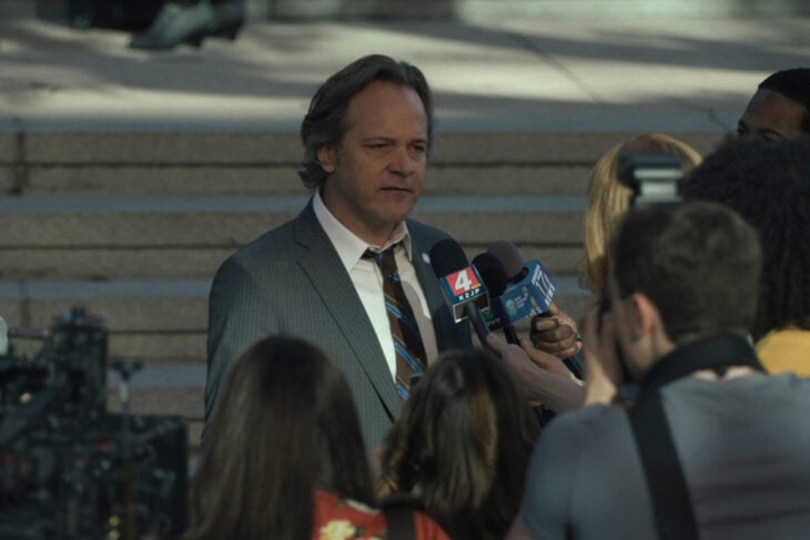 Tommy talking to reporter.