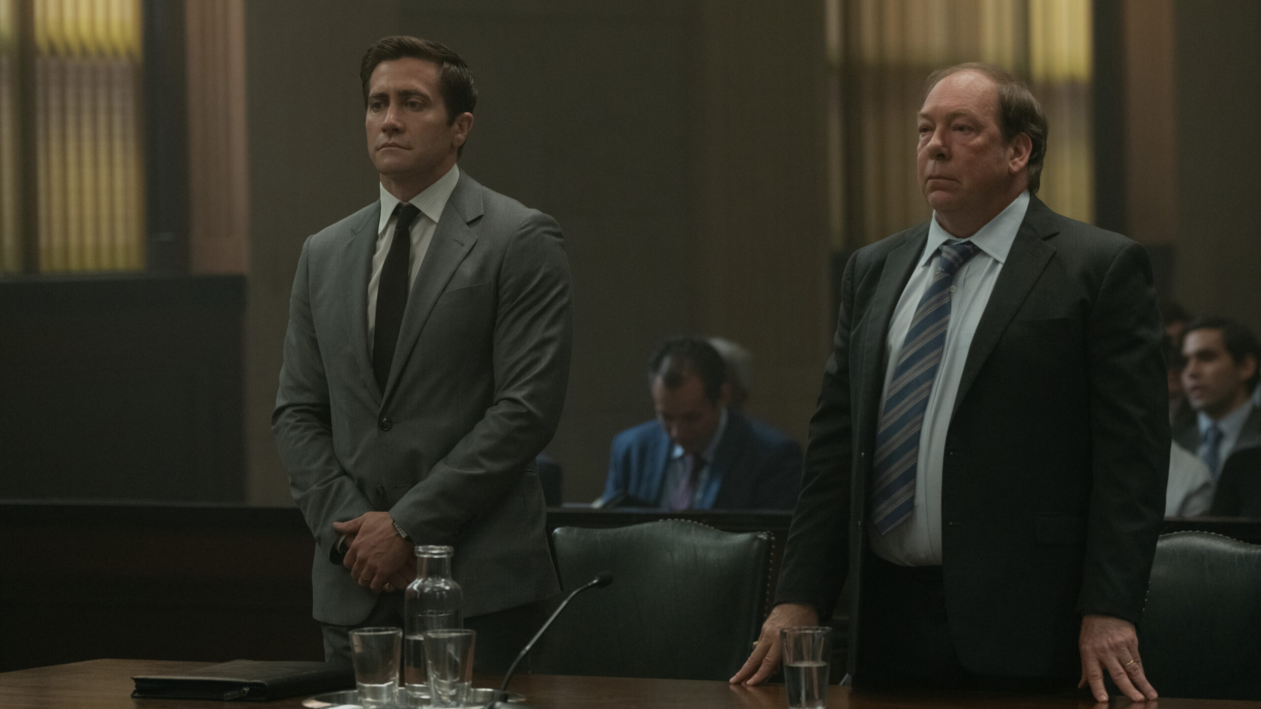 Presumed_Innocent_Photo_010803 | Tell-Tale TV Jake Gyllenhaal and Bill Camp standing together in court behind the defense table.