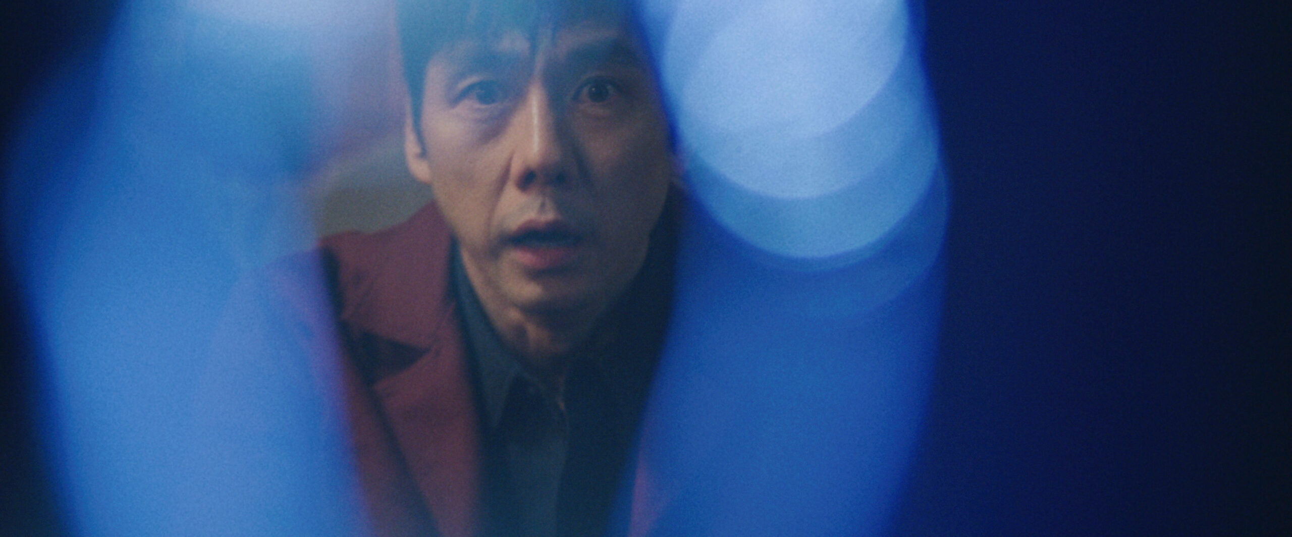A closeup of Masa's face as he looks at something in shock on Sunny Season 1 Episode 5, "Joey Sakamoto."