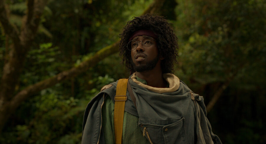 Time Bandits Season 1 Episode 3 - Roger Jean Nsengiyumva | Tell-Tale TV Still from Time Bandits Season 1 Episode 3 of Roger Jean Nsengiyumva.