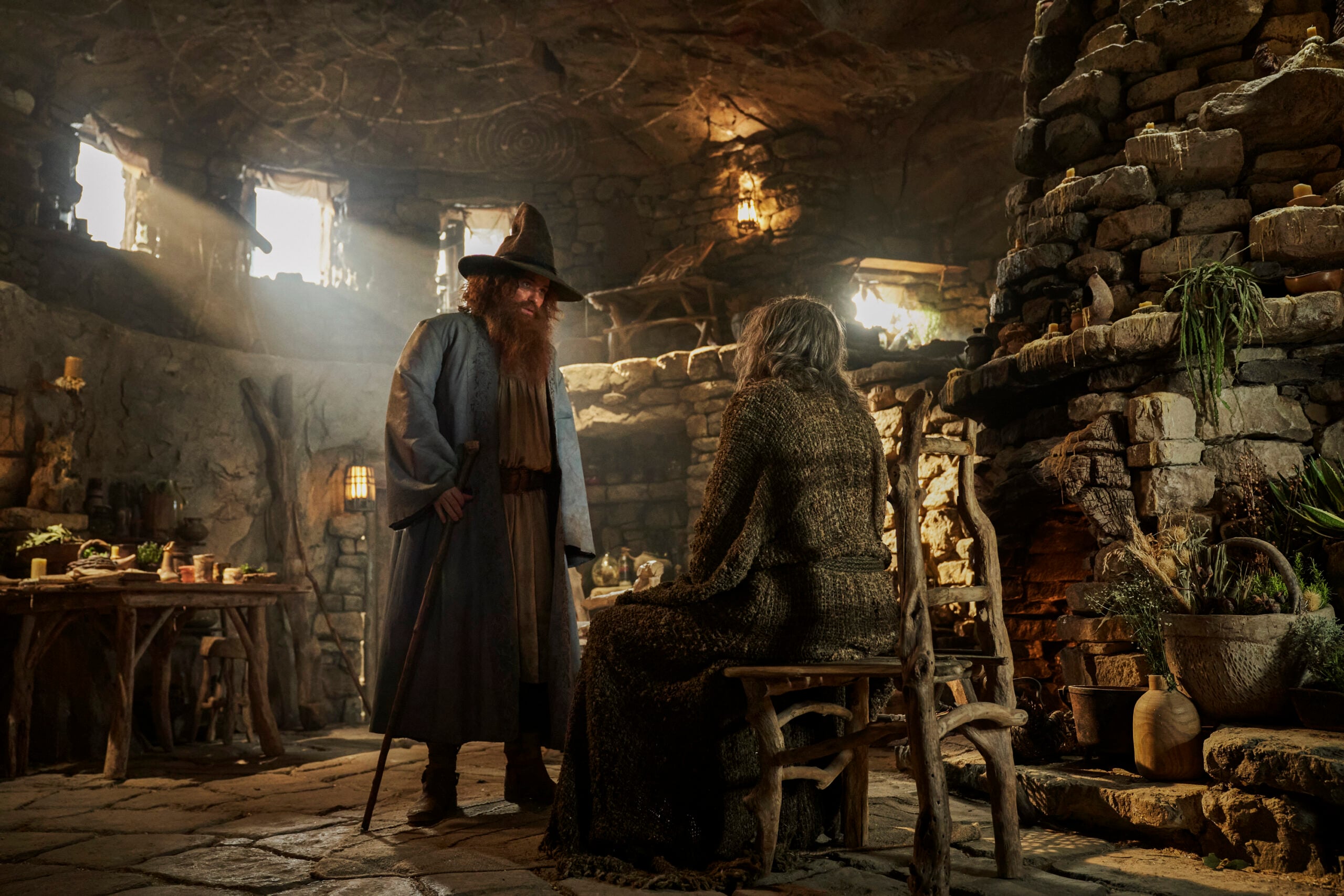 Still from The Lord of the Rings: The Rings of Power Season 2 of Charlie Rory Kinnear as “Tom Bombadil” (Left) and Daniel Weyman as “The Stranger” (Right).