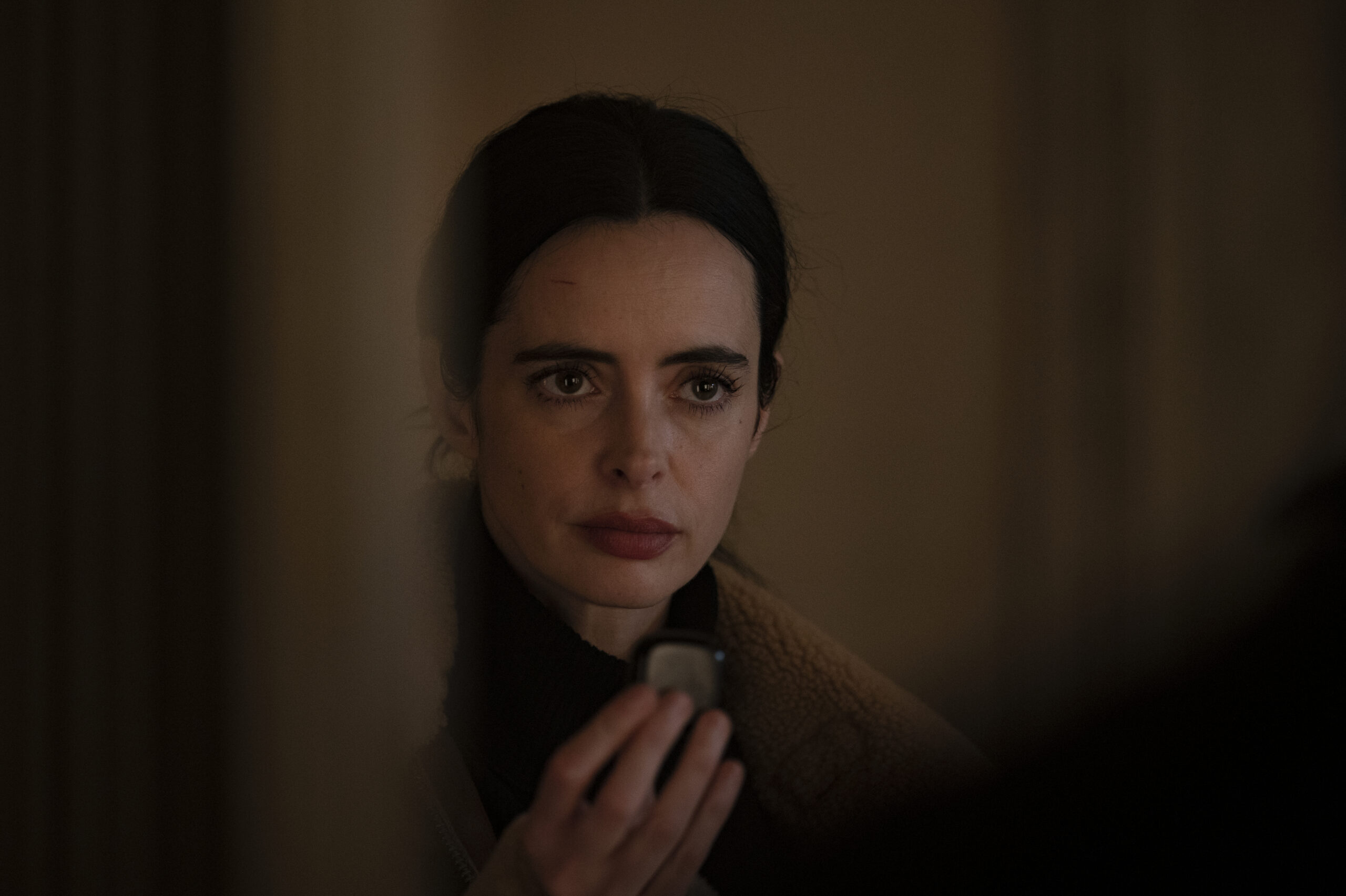 Still from Orphan Black: Echoes Season 1 Episode 8 of Krysten Ritter as Lucy.