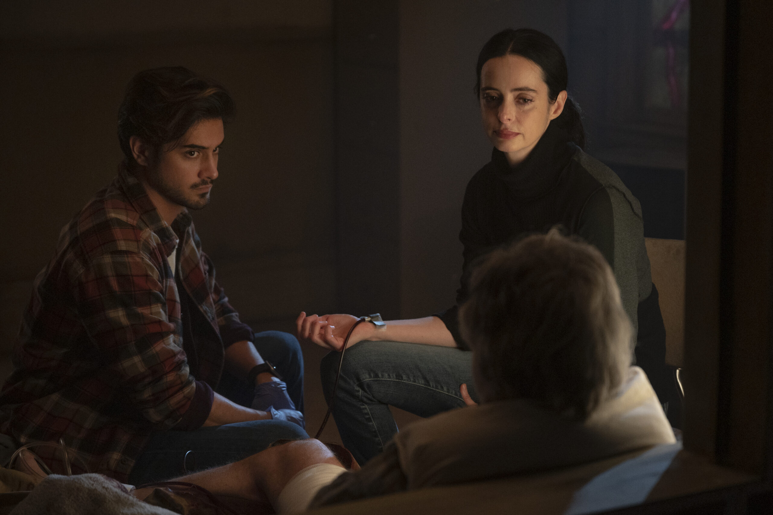 Still from Orphan Black: Echoes Season 1 Episode 9 of Krysten Ritter as Lucy and Avan Jogia as Jack pictured from left to right.