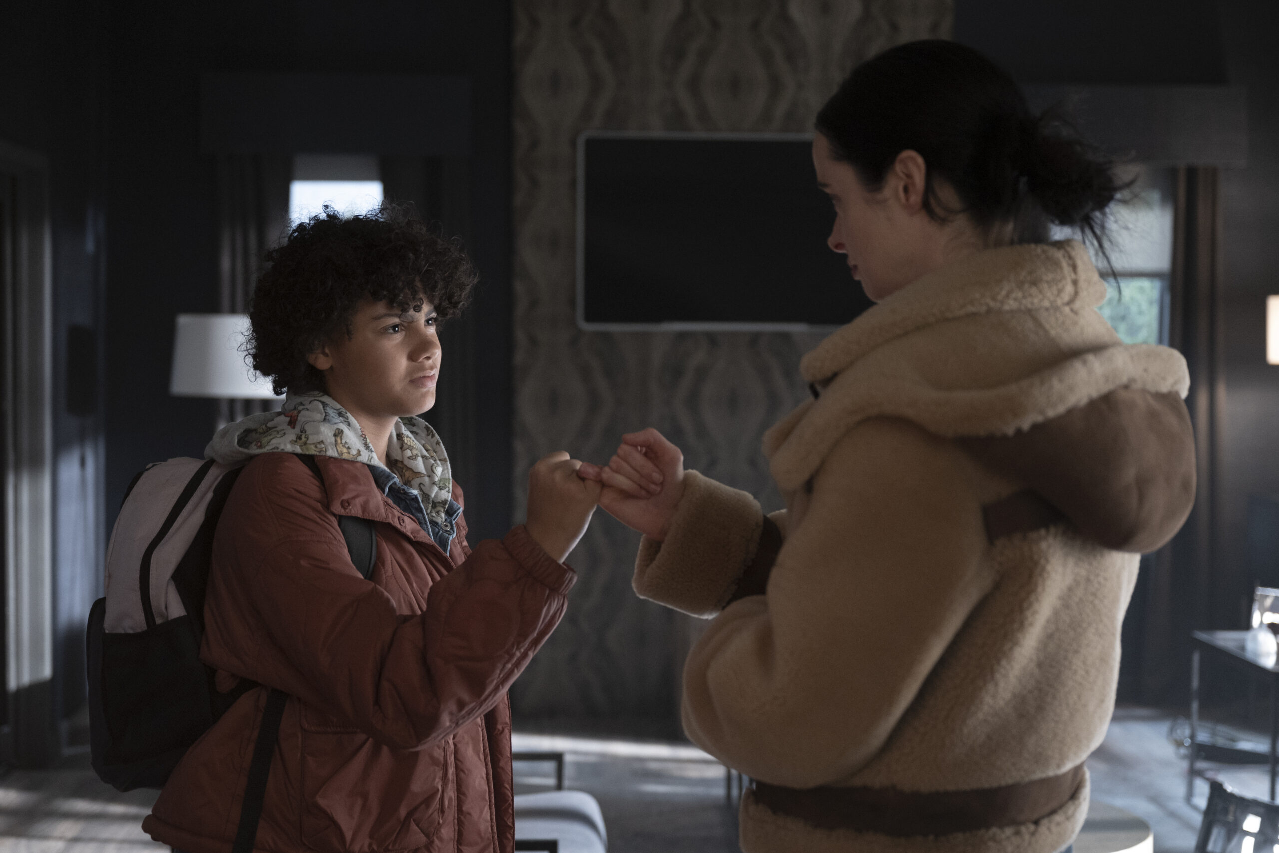 Still from Orphan Black: Echoes Season 1 Episode 10 of Krysten Ritter as Lucy and Zariella Langford as Charlie pictured from left to right.