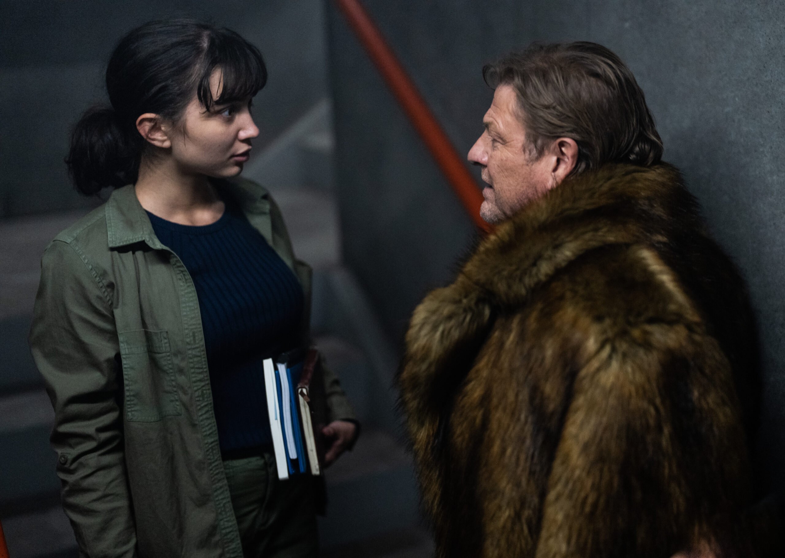 Still from Snowpiercer Season 4 Episode 5 of Rowan Blanchard and Sean Bean pictured from left to right.