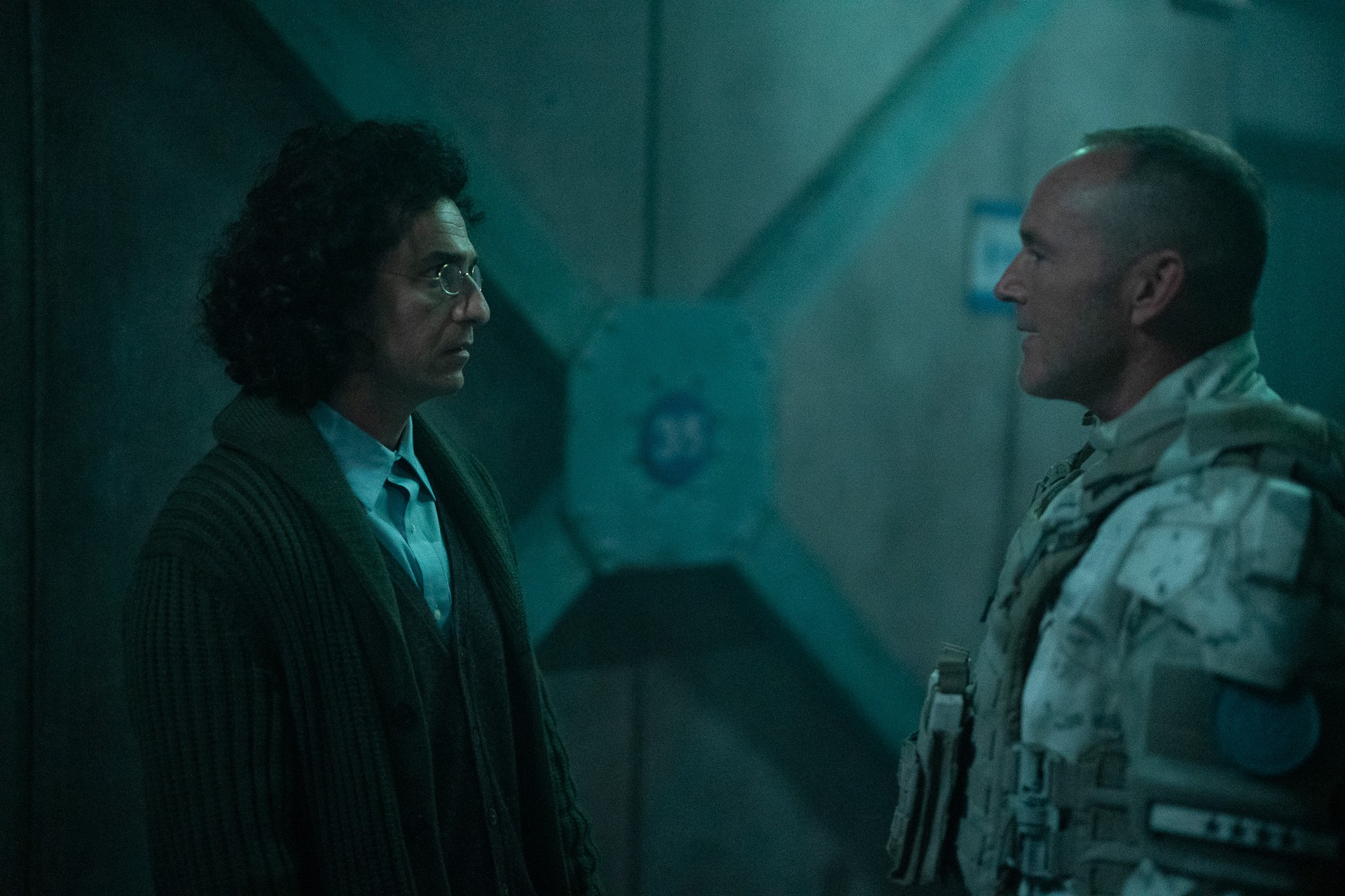 Snowpiercer Season 4 Episode 7 - Michael Aronov and Clark Gregg | Tell-Tale TV Still from Snowpiercer Season 4 Episode 7 of Michael Aronov and Clark Gregg pictured from left to right.