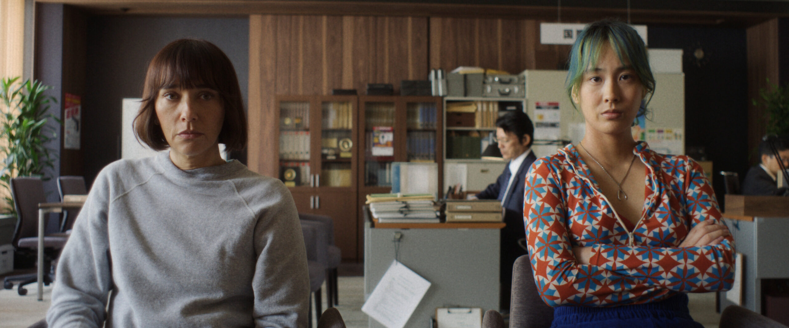 Sunny Season 1 Episode 6 Kyoto Manju So Delicious | Tell-Tale TV Suzie and Mixxy sit in a police station on Sunny Season 1 Episode 6, "Kyoto Manju So Delicious."