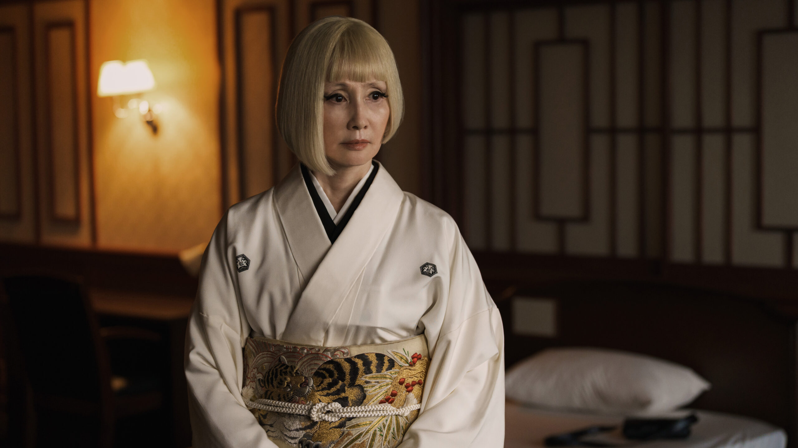 Hime wears a white kimono while standing in a room and looking somber on Sunny Season 1 Episode 7, "There's Been a Shift."
