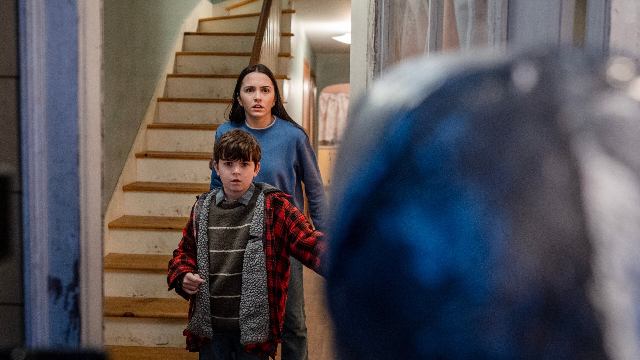 FROM Season 3 Episode 1, "Shatter." | Hannah Cheramy and Simon Webster looking out the front door frighteningly