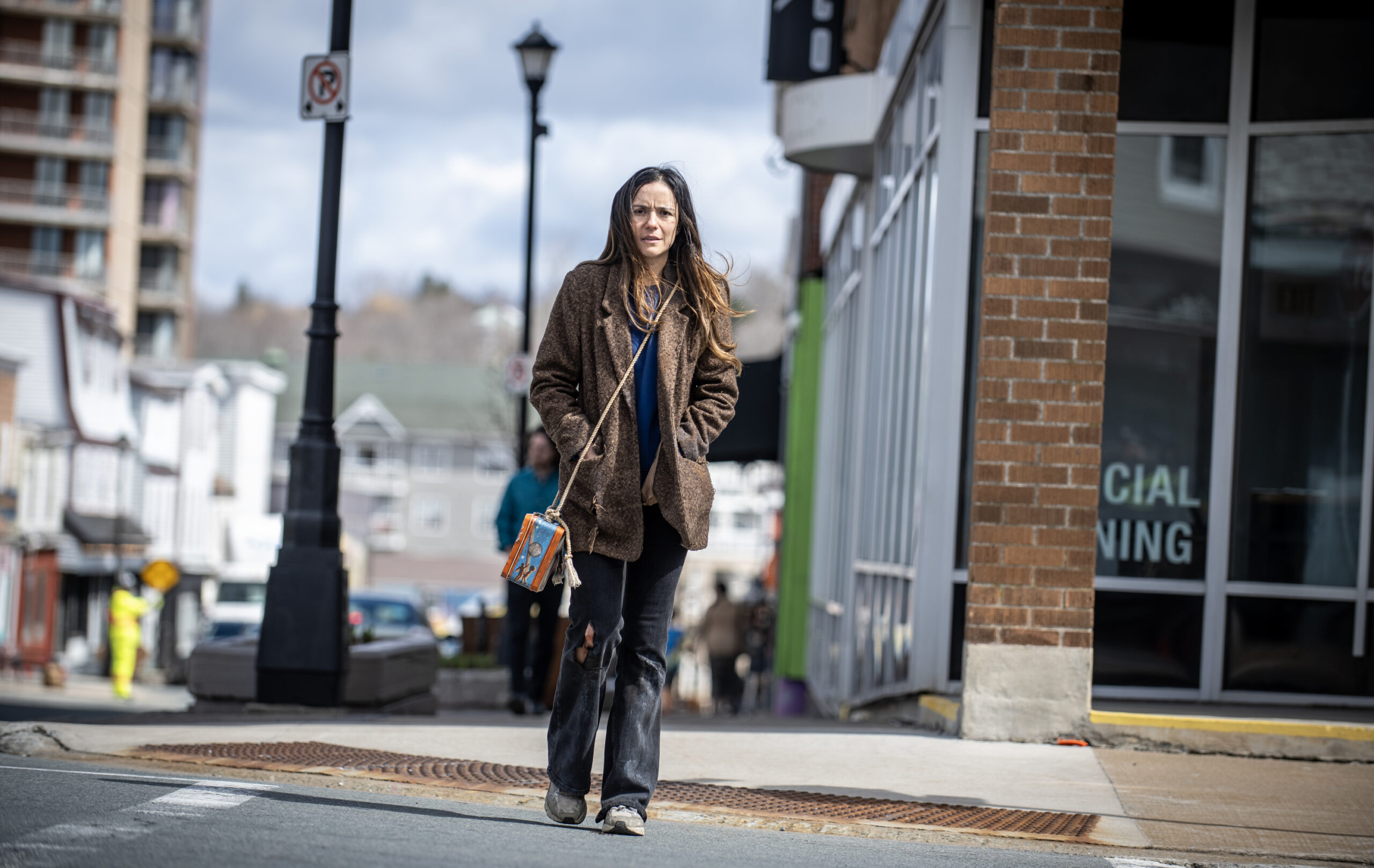 FROM Season 3 Episode 1, "Shatter." Catalina Sandino Moreno walking through town