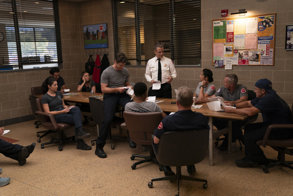 CHICAGO FIRE -- "A Monster In the Field" Episode 13001 -- Pictured: (l-r) Hanako Greensmith as Violet Mikami, Jocelyn Hudon as Novak, Jake Lockett as Sam Carver, Dermot Mulroney as Chief Dom Pascal, Miranda Rae Mayo as Stella Kidd, David Eichenberg as Christopher Herrmann, Anthony Ferraris as Tony -- (Photo by: Peter Gordon/NBC)