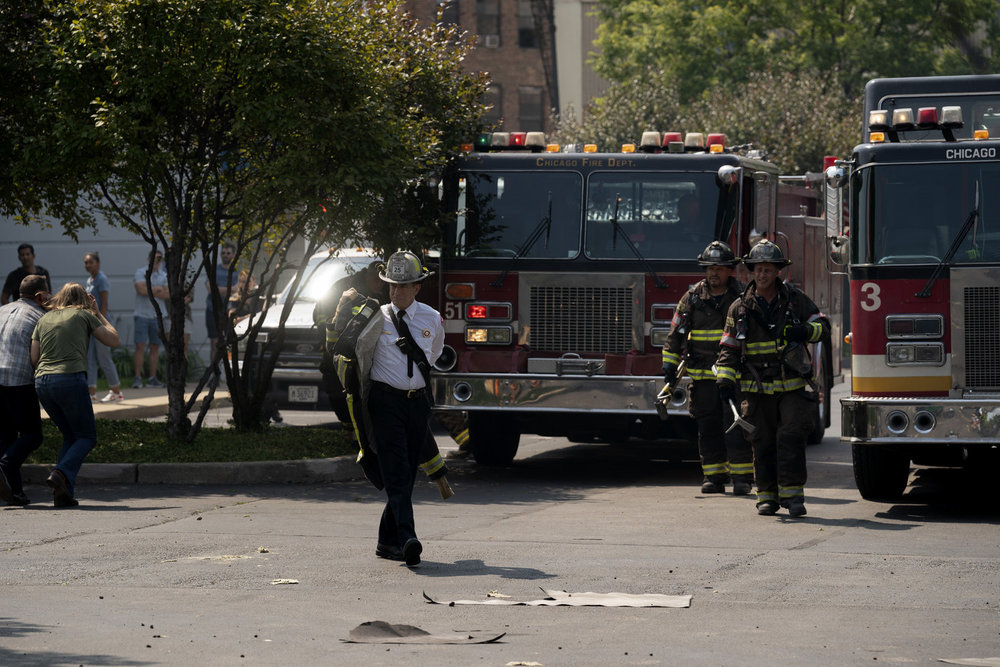 CHICAGO FIRE -- "A Monster In the Field" Episode 13001 -- Pictured: (l-r) Dermot Mulroney as Chief Dom Pascal, Joe Miñoso as Joe Cruz, Taylor Kinney as Kelly Severide -- (Photo by: Peter Gordon/NBC)