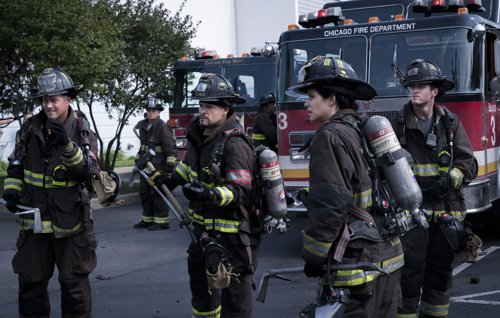CHICAGO FIRE -- "A Monster In the Field" Episode 13001 -- Pictured: (l-r) Taylor Kinney as Kelly Severide, Joe Miñoso as Joe Cruz, Miranda Rae Mayo as Stella Kidd, Jake Lockett as Sam Carver -- (Photo by: Peter Gordon/NBC)