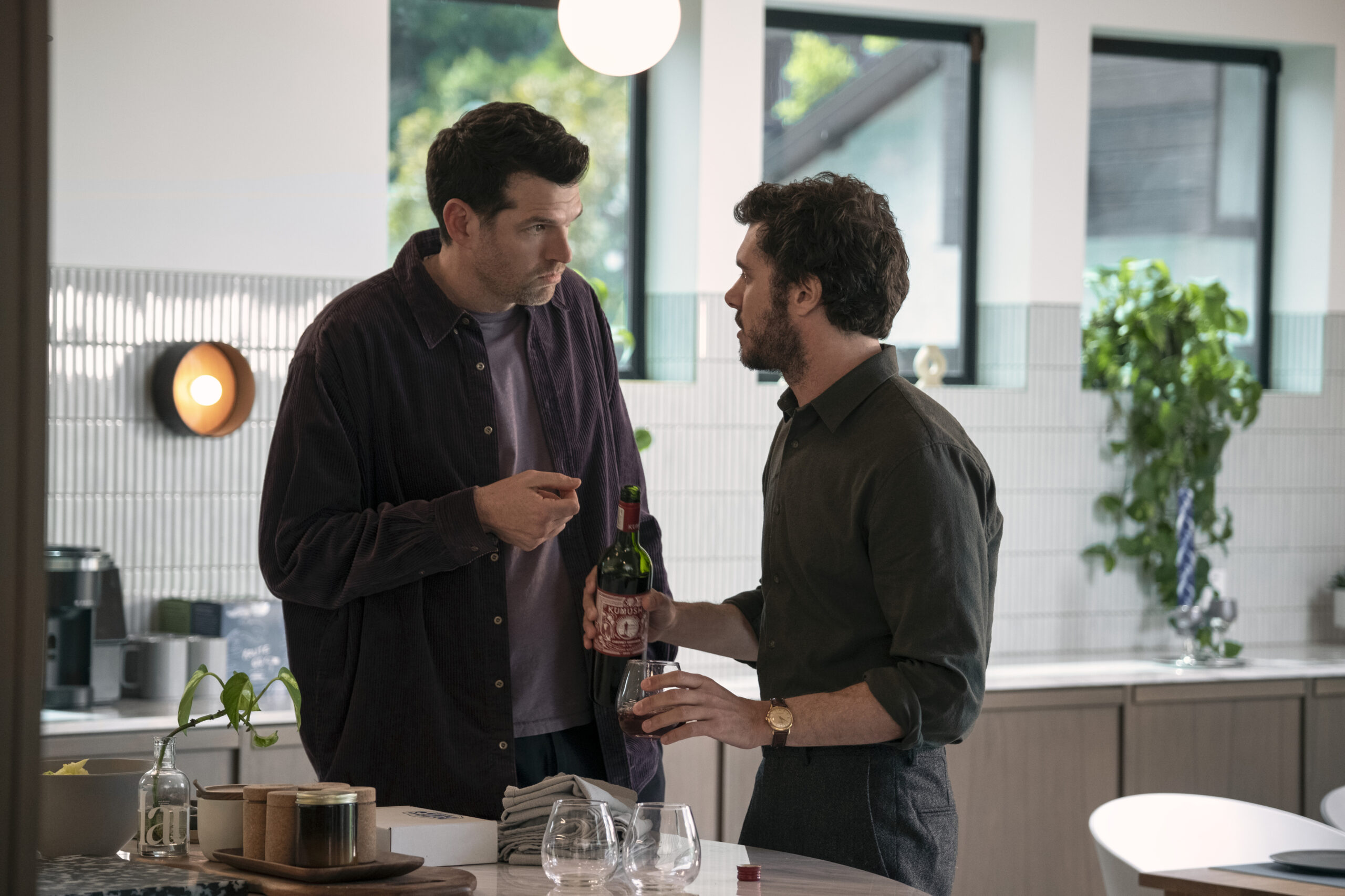 Nobody Wants This Season 1 Episode 8 - Timothy Simons and Adam Brody | Tell-Tale TV Still from Nobody Wants This Season 1 Episode 8 of Timothy Simons as Sasha and Adam Brody as Noah.