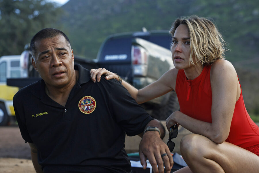 RESCUE: HIGH SURF Season 1 Episode 3 - Robbie Magasiva and Arielle Kebbel | Tell-Tale TV Still from RESCUE: HIGH SURF Season 1 Episode 3 of Robbie Magasiva and Arielle Kebbel pictured from left to right.