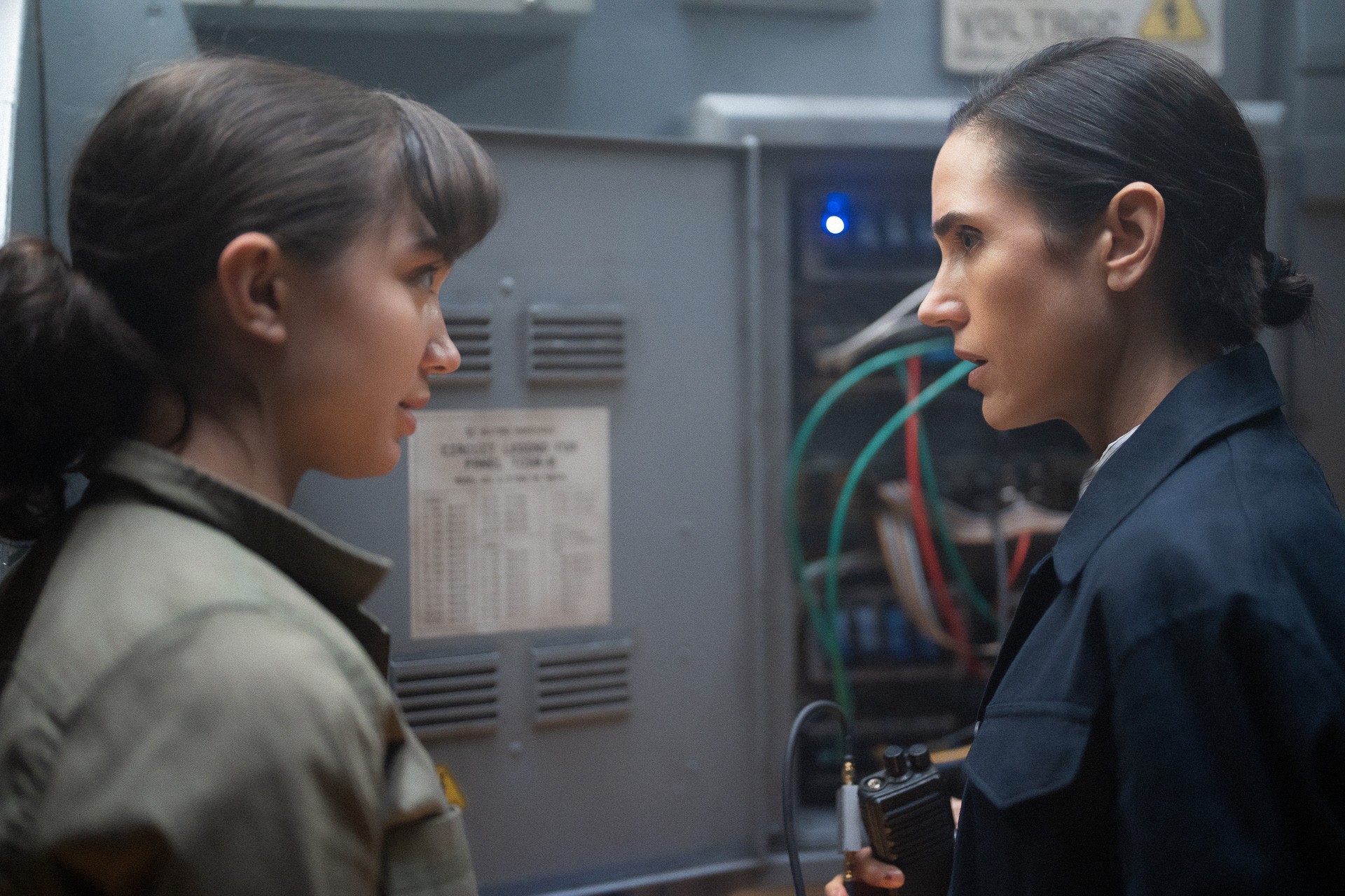 Snowpiercer Season 4 Episode 9 - Jennifer Connelly and Rowan Blanchard | Tell-Tale TV Still from Snowpiercer Season 4 Episode 9 of Jennifer Connelly and Rowan Blanchard pictured from left to right.