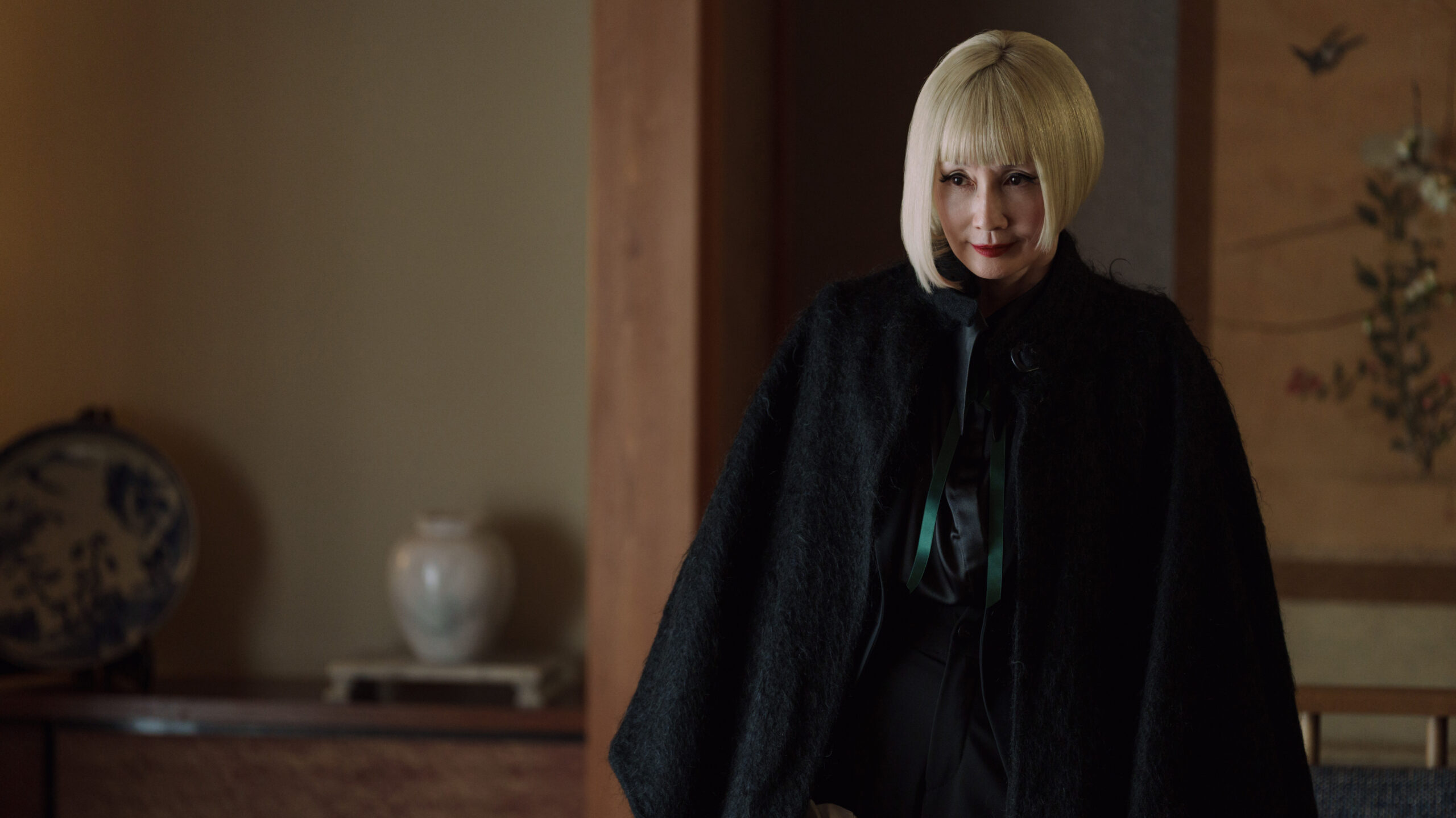 Sunny Season 1 Episode 10 The Dark Manual | Tell-Tale TV Hime looks villainous while standing in her cousin's home on Sunny Season 1 Episode 10, "The Dark Manual."
