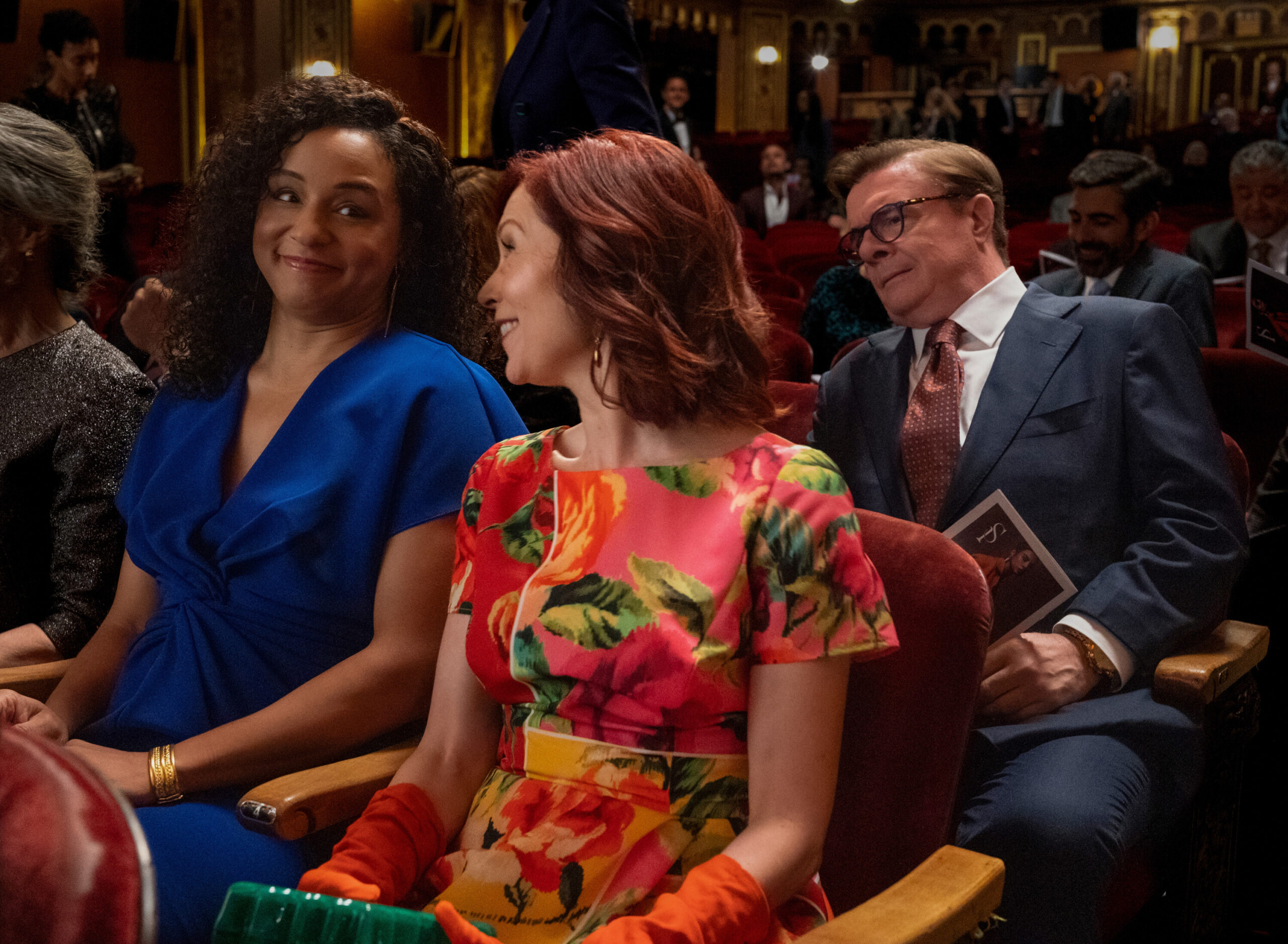 Still from Elsbeth Season 2 Episode 1 of Carra Patterson as Kaya Blanke, and Carrie Preston as Elsbeth Tascioni, and Nathan Lane as Phillip Cross pictured left to right.