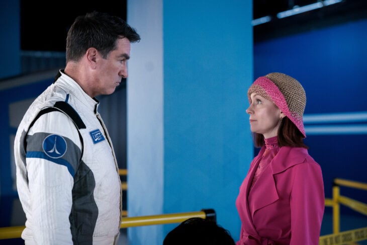 Still from Elsbeth Season 2 Episode 2 of Rob Riggle as Neal Dorsey and Carrie Preston as Elsbeth Tascioni pictured from left to right.