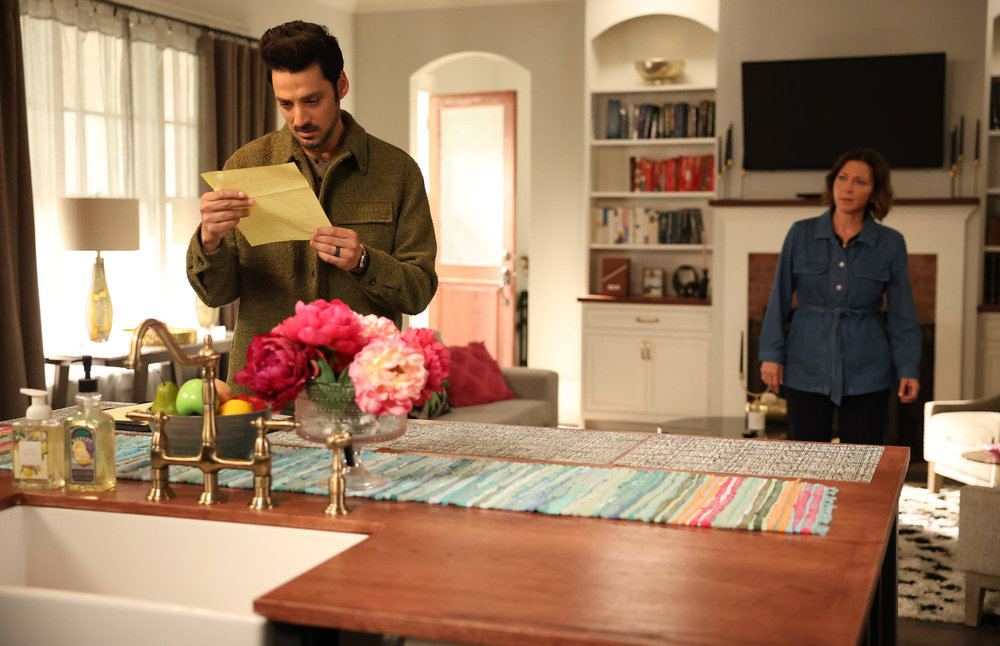 Still from Found Season 2 Episode 3 of Karan Oberoi as Dahn and Kelli Williams as Margaret pictured from left to right.