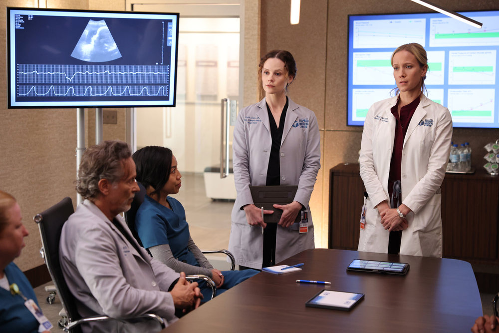 Chicago Med - Season 10 | Tell-Tale TV CHICAGO MED -- "Blurred Lines" Episode 1004 -- Pictured: (l-r) Sarah Ramos as Dr. Caitlin Lenox, Jessy Schram as Dr. Hannah Asher