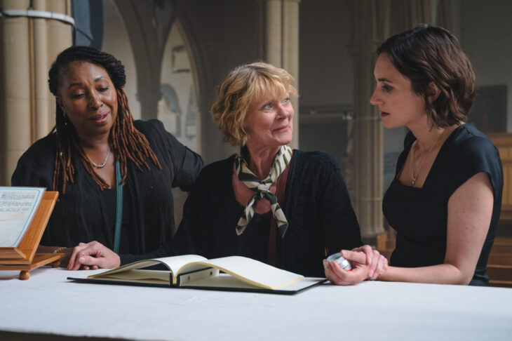 THE MARLOW MURDER CLUB ON MASTERPIECE Season 1 Episode 2 - Suzie Harris, Judith Potts, Becks Starling | Tell-Tale TV Still from Marlow Murder Club on Masterpiece of Jo Martin as Suzie Harris, Samantha Bond as Judith Potts, and Cara Horgan as Becks Starling pictured from left to right. The Marlow Murder Club Season 1 Episode 2 Review Still from Marlow Murder Club on Masterpiece of Jo Martin as Suzie Harris, Samantha Bond as Judith Potts, and Cara Horgan as Becks Starling pictured from left to right.