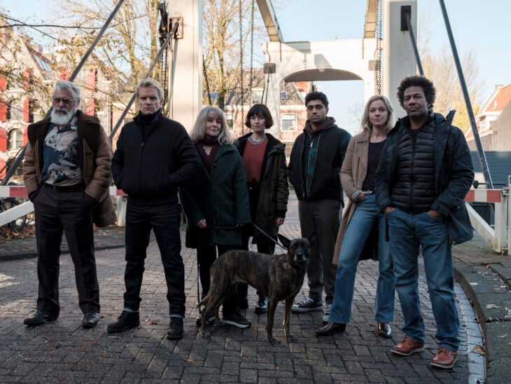 VAN DER VALK SEASON 4 EPISODE 6 - Hendrik Davie, Piet Van der Valk, Julia Dahlman, Lucienne Hassell, Eddie Suleman, Lena Linderman, Cliff Palache___ | Tell-Tale TV Still from VAN DER VALK SEASON 4 Episode ON MASTERPIECE of Hendrik Davie, Piet Van der Valk, Julia Dahlman, Lucienne Hassell, Eddie Suleman, Lena Linderman, Cliff Palache pictured from left to right. Van Der Valk Season 4 Episode 6 Review: Secrets in Amsterdam: Part 2 Still from VAN DER VALK SEASON 4 Episode ON MASTERPIECE of Hendrik Davie, Piet Van der Valk, Julia Dahlman, Lucienne Hassell, Eddie Suleman, Lena Linderman, Cliff Palache pictured from left to right.