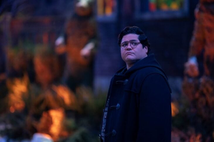 Guillermo stands outside an old house on Staten Island at night on What We Do in the Shadows Season 6 Episode 6, "Laszlo's Father."