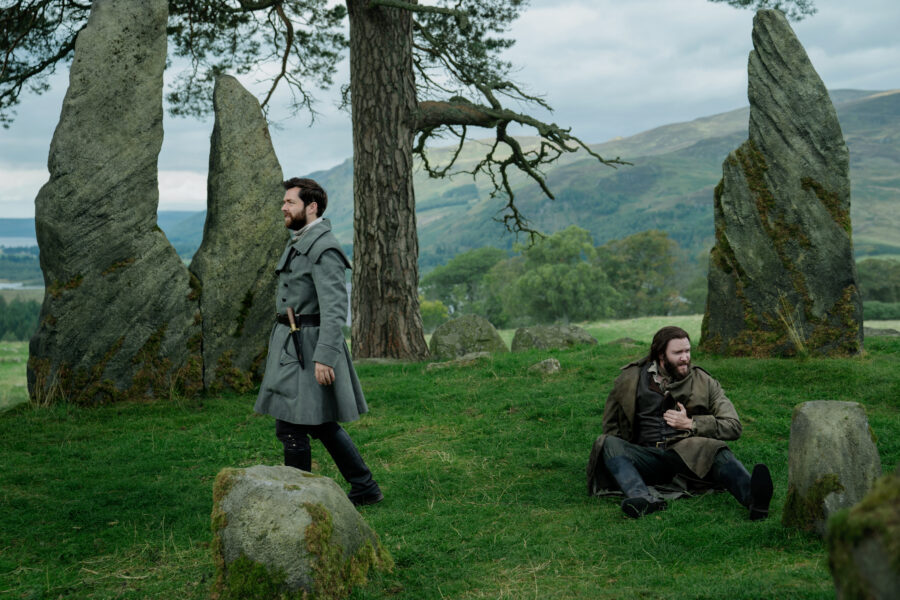 Outlander Season 7 Part 2 — Richard Rankin as Roger MacKenzie and Diarmaid Murtagh as William "Buck" MacKenzie