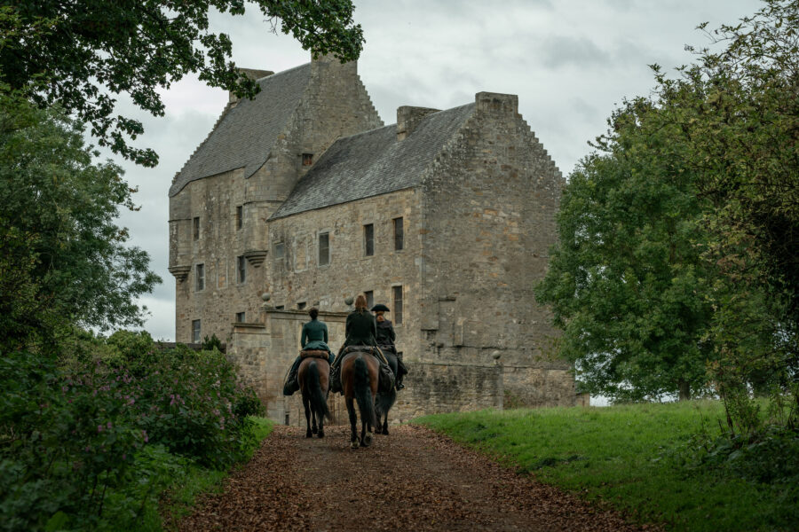 Outlander Season 7 Part 2 - Caitriona Balfe as Claire Randall Fraser, Sam Heughan as Jamie Fraser, John Bell as Young Ian