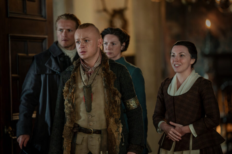 Outlander Season 7 Episode 9 - Caitriona Balfe as Claire Randall Fraser, Sam Heughan as Jamie Fraser, Kristin Atherton as Jenny, John Bell as Young Ian