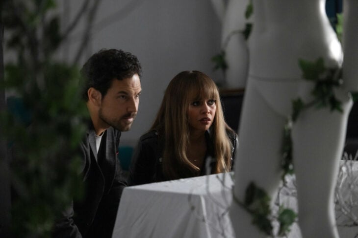 Wild Cards Season 2 Episode 8, "Death by Design" -- Giacomo Gianniotti as Detective Cole Ellis and Vanessa Morgan as Max Mitchell