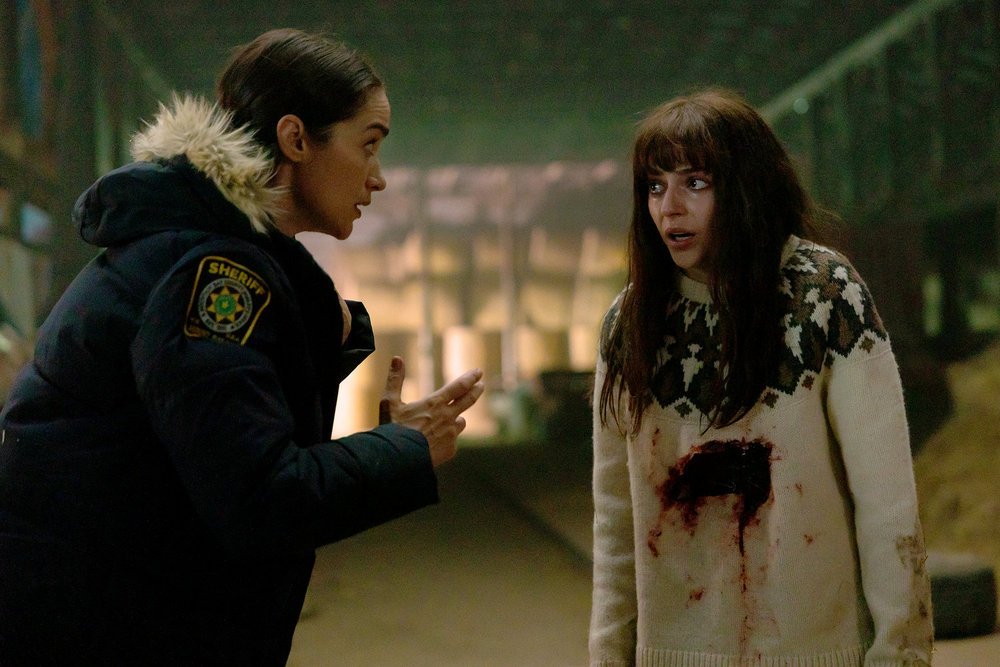 Still from Revival Season 1 Episode 2 of Melanie Scrofano as Dana Cypress and Romy Weltman as Martha "Em" Cypress pictured from left to right.