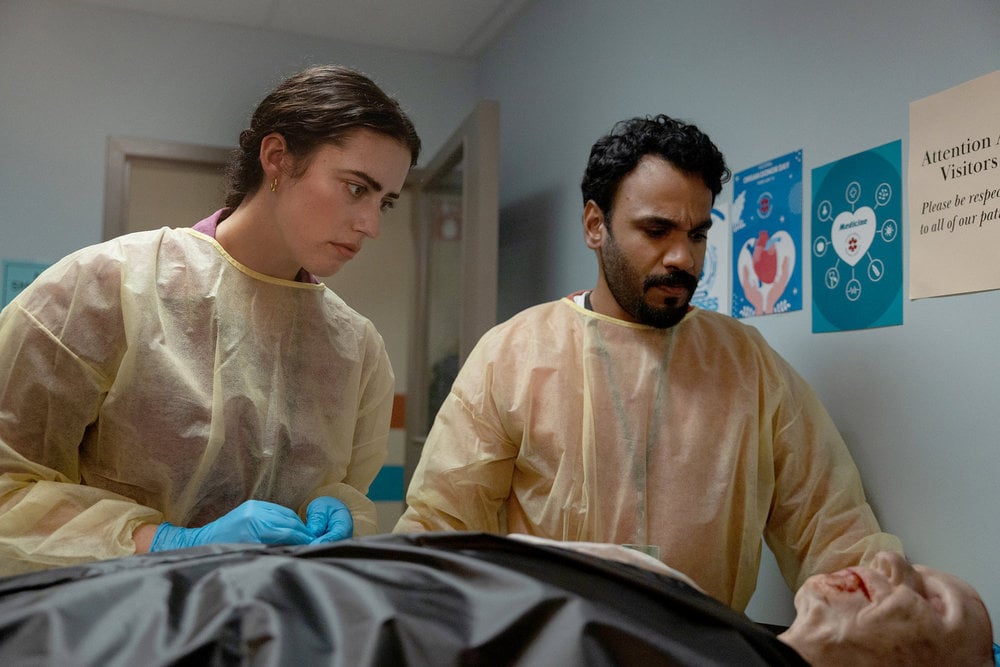 Still from Season 1 Episode 2 of Carla Morel as Carly Morel, Andy McQueen as Ibrahim Ramin pictured from left to right.