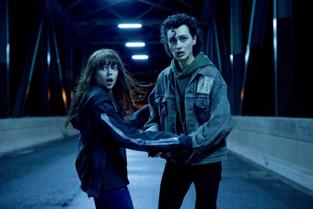 Still from Revival Season 1 Episode 3 of Romy Weltman as Martha "Em" Cypress and Kaleb Horn as Rhodey Rasch pictured from left to right.