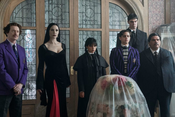 Wednesday Season 2 Episode 1 -- Steve Buscemi as Barry Dort, Catherine Zeta-Jones as Morticia Addams, Jenna Ortega as Wednesday Addams, Isaac Ordonez as Pugsley Addams, Joonas Suotamo as Lurch, Luis Guzmán as Gomez Addams