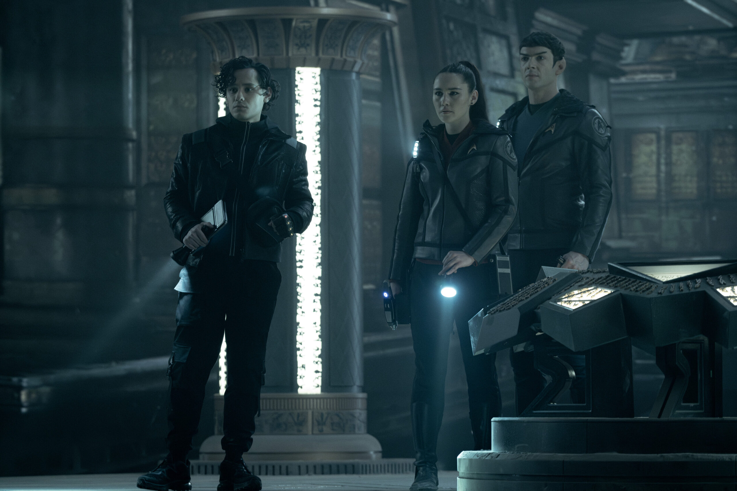 Mynor Luken as Beto, Christina Chong as La'an, and Ethan Peck as Spock on Star Trek: Strange New Worlds Season 3 Episode 5, "Through the Lens of Time."